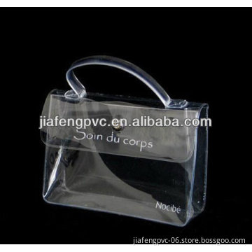 Clear crystal TPU trousse with handle and snap button
